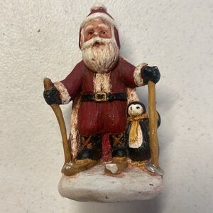 Vintage Santa Skiing with Penguin Friend Decor